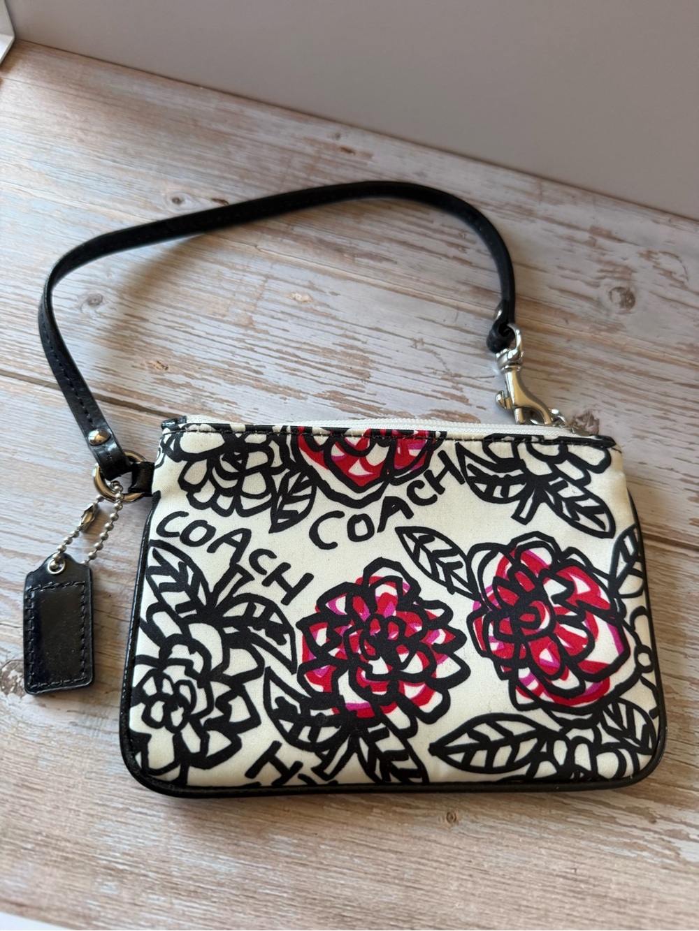 Coach Floral Wristlet in White and Red doodle
